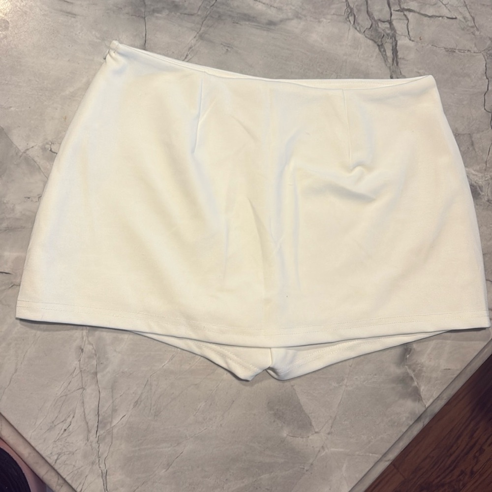Pacsun-White shirt with built-in shorts..Never worn.